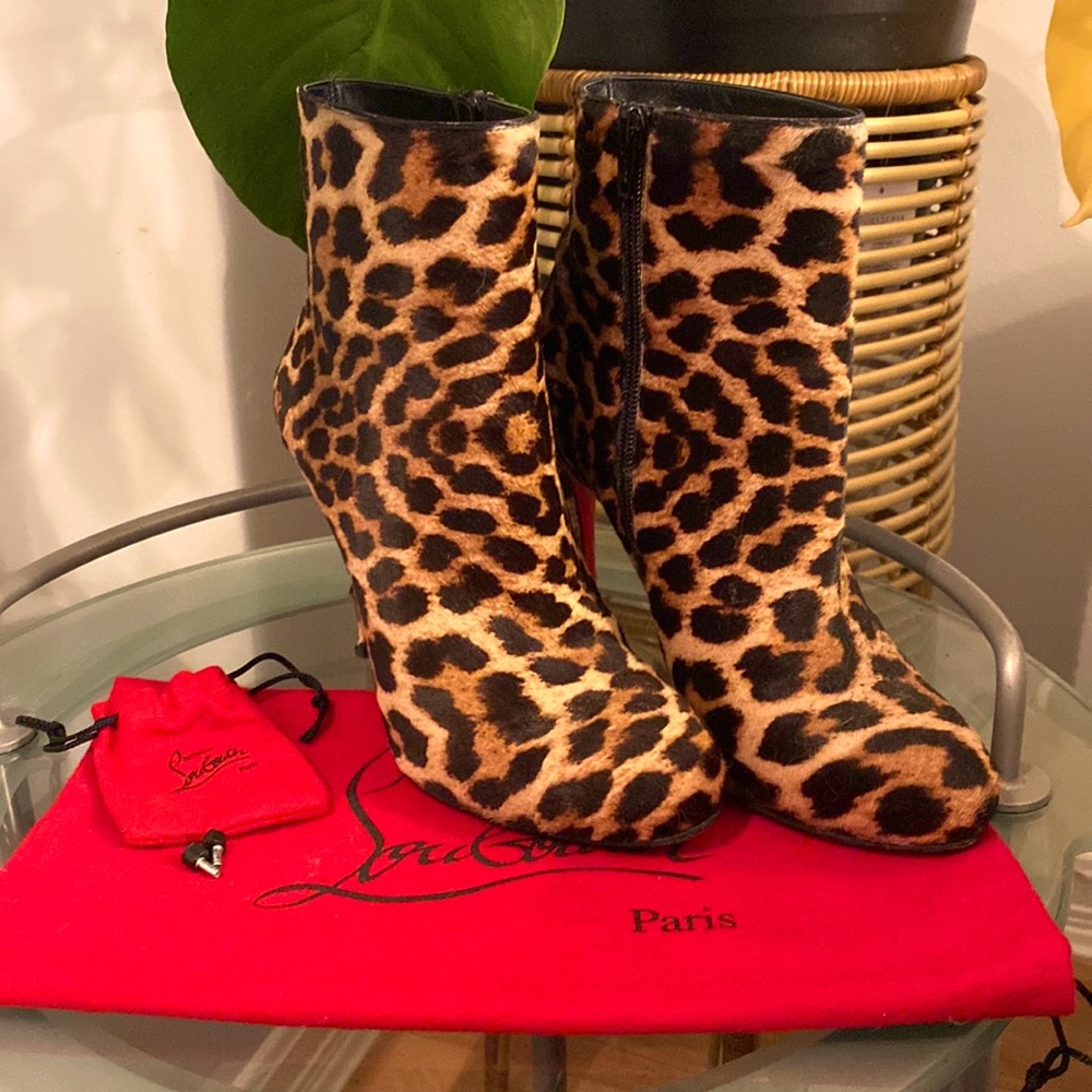 Christian Louboutin jaguar/cheetah fur boots.